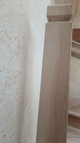 another image of newel post angled away from wall
