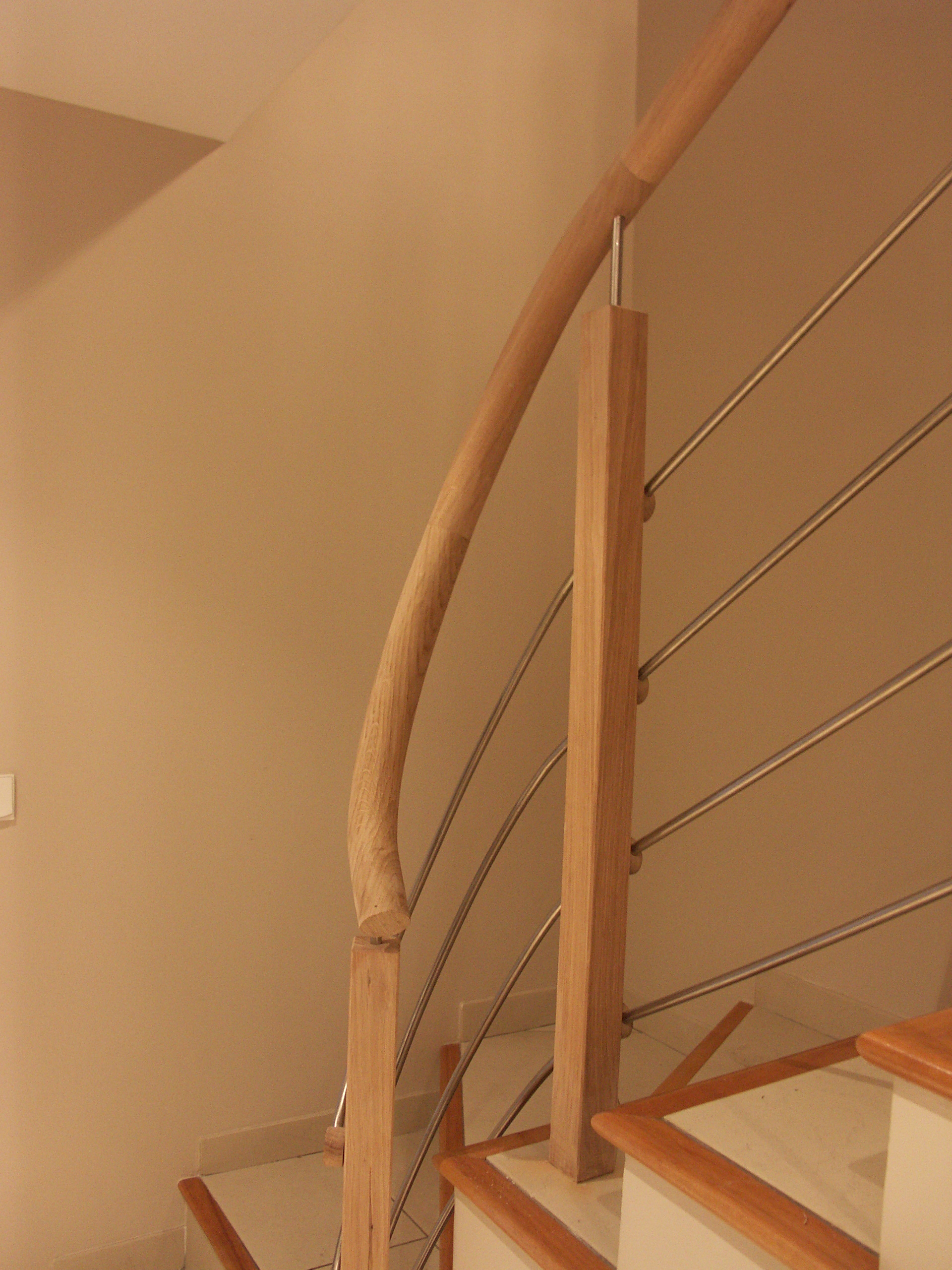 Geometrical round rail on cement stair Geometrical round rail on cement stair